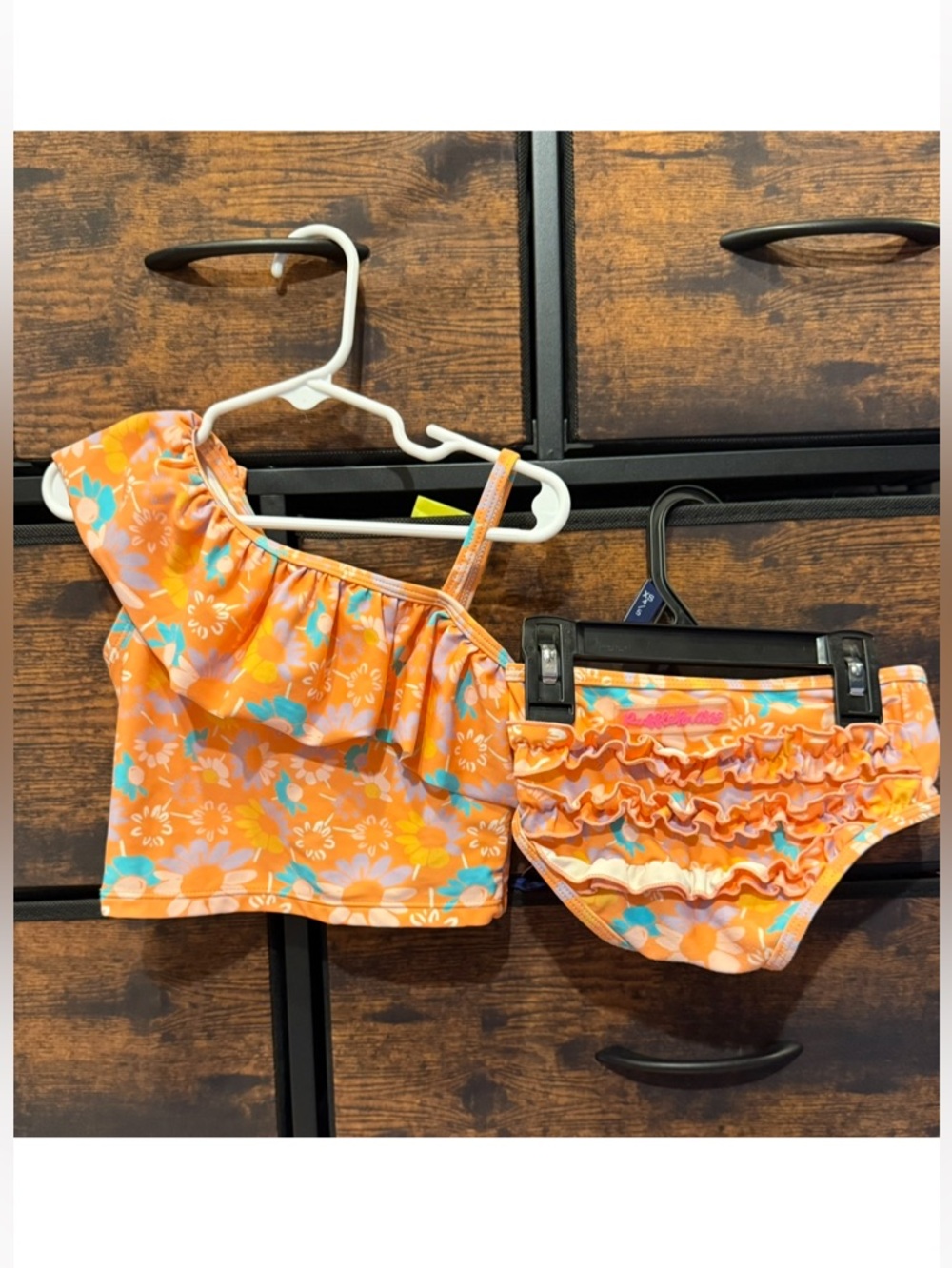 RUFFLEBUTTS 
ONE SHOULDER RUFFLE TANKINI SWIMSUIT
Coral Floral 4t